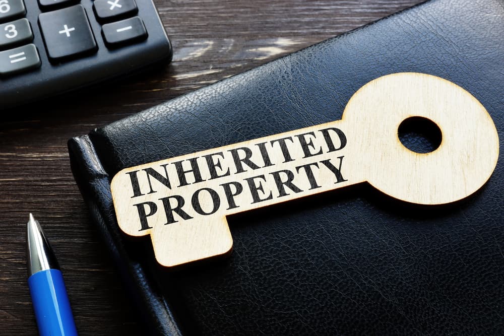 inherited property phrase on wooden key